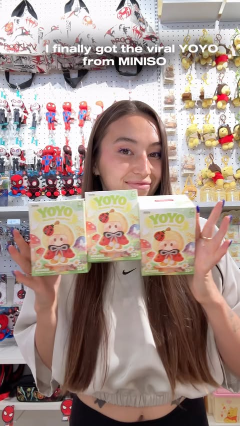 Instagram post by @regina_davv for MINISO. Caption reads: [...] unboxing the viral YOYO blind boxes from....