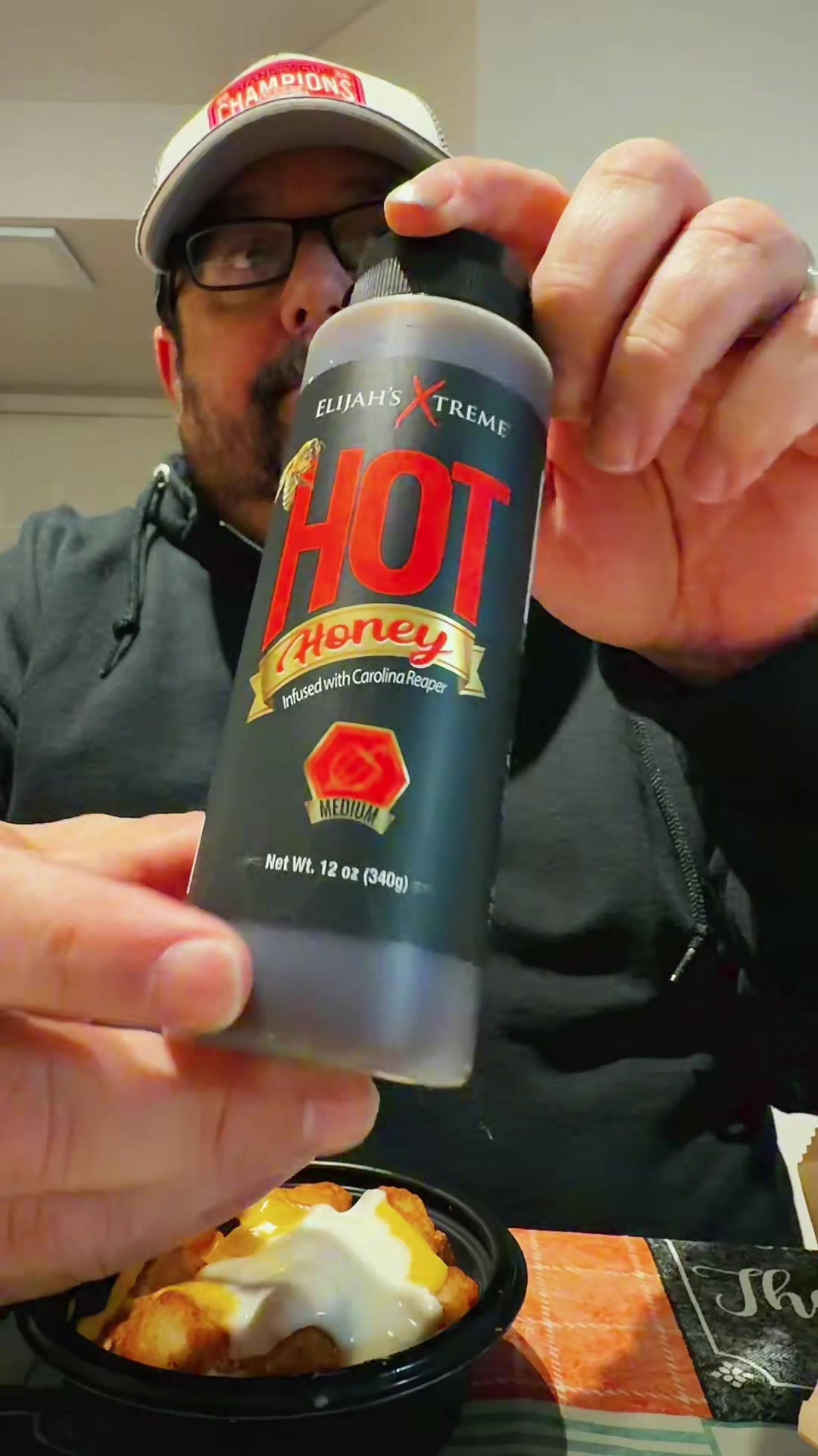 TikTok post by @gangsta_gramps for Elijah's Xtreme. Caption reads: @Elijah’s Xtreme Hot Sauce #tiktokshop #viral.