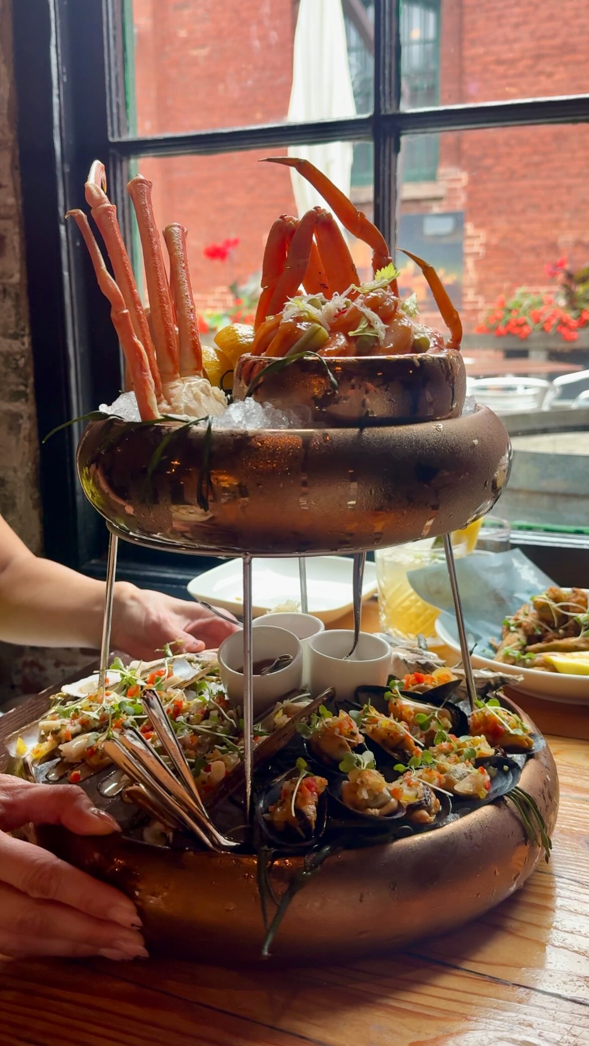Instagram post by @rachrivero for Date Ideas Toronto. Caption reads: 🦞 Fresh, Flavourful & Unforgettable, From the Sea....