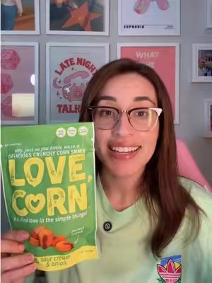 TikTok post by @itsfrancinecorrea for LOVE CORN. Caption reads: AD | Tried LOVE CORN for the first time and I'm....