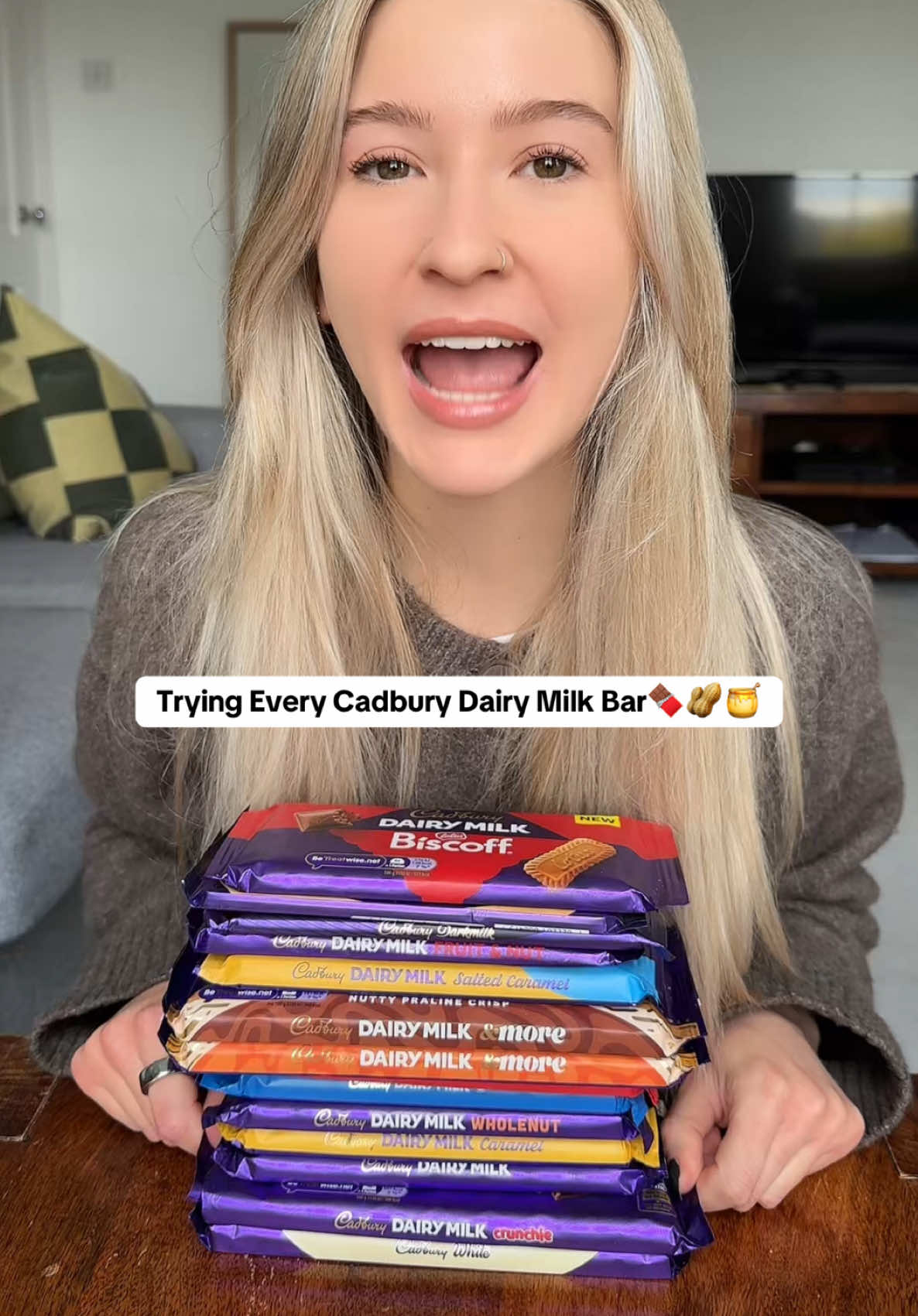 TikTok post by @emiiyjade for Cadbury. Caption reads: trying EVERY Cadbury Dairy Milk Bar🍫🥛dream video....
