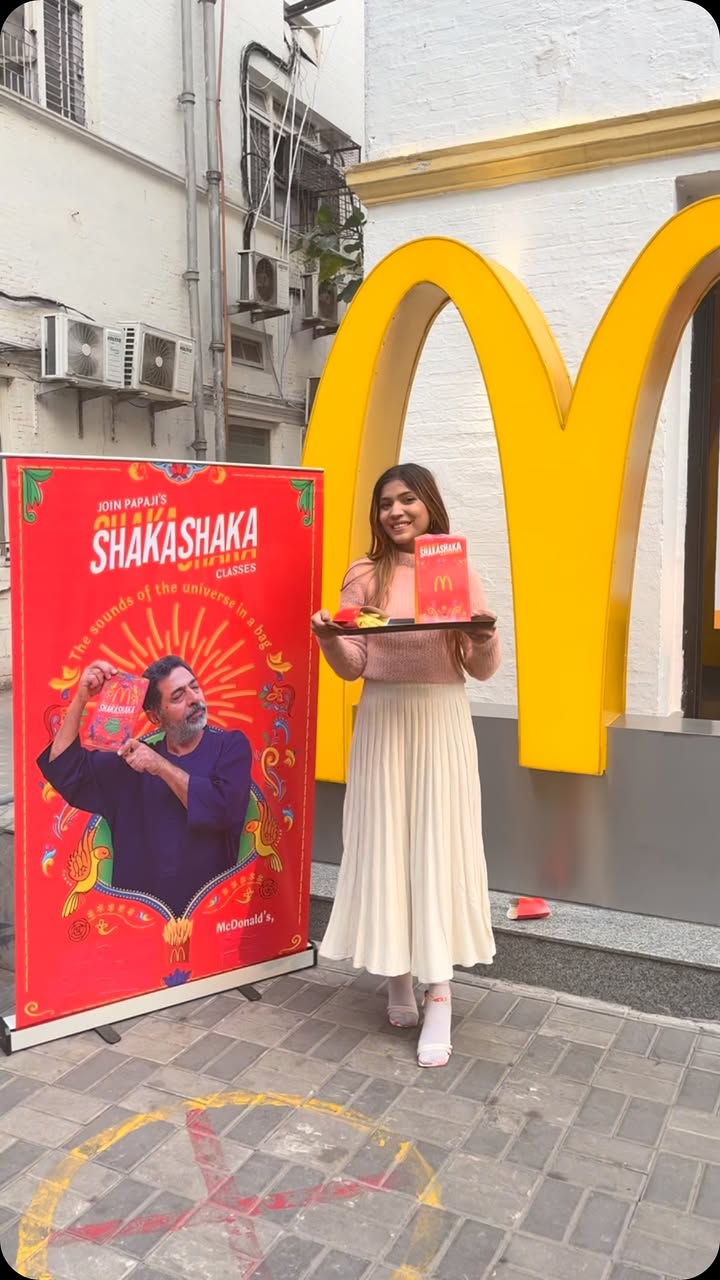 Instagram post by @itslittleflame for McDonald's India. Caption reads: “The universe speaks in rhythm, so does your....