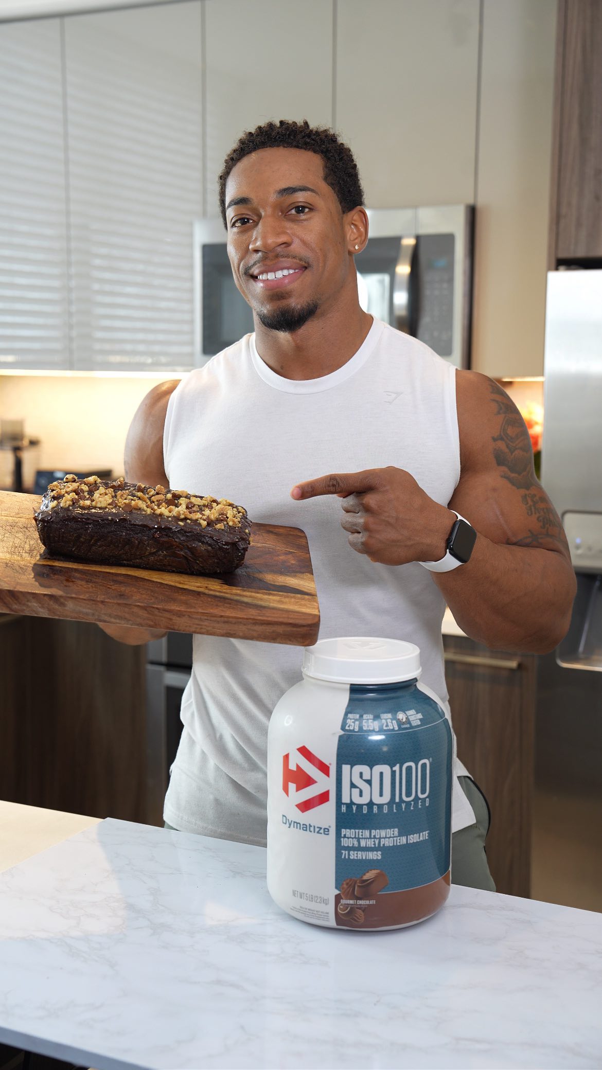 Instagram post by @jbailey_justdoit for Dymatize. Caption reads: Easy Healthy Protein Brownies. No lie, I almost....
