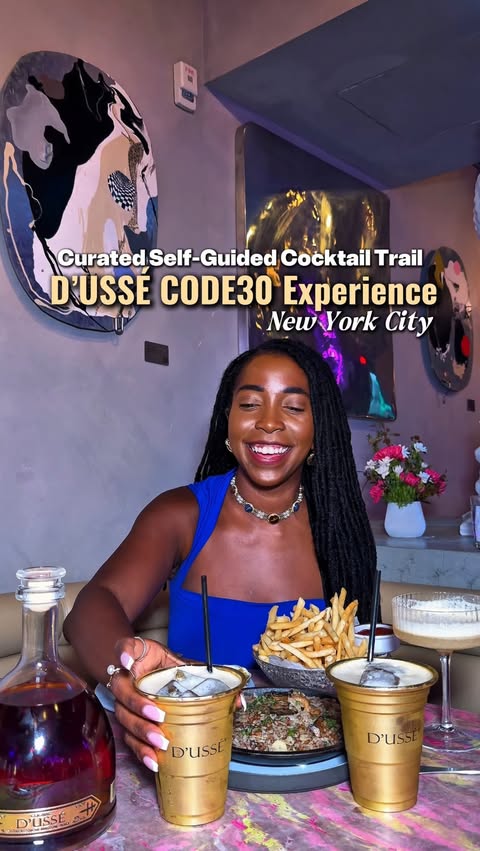 Instagram post by @theexcursiondoctor for D'USSE Cognac. Caption reads: [...] in New York City This Summer With....