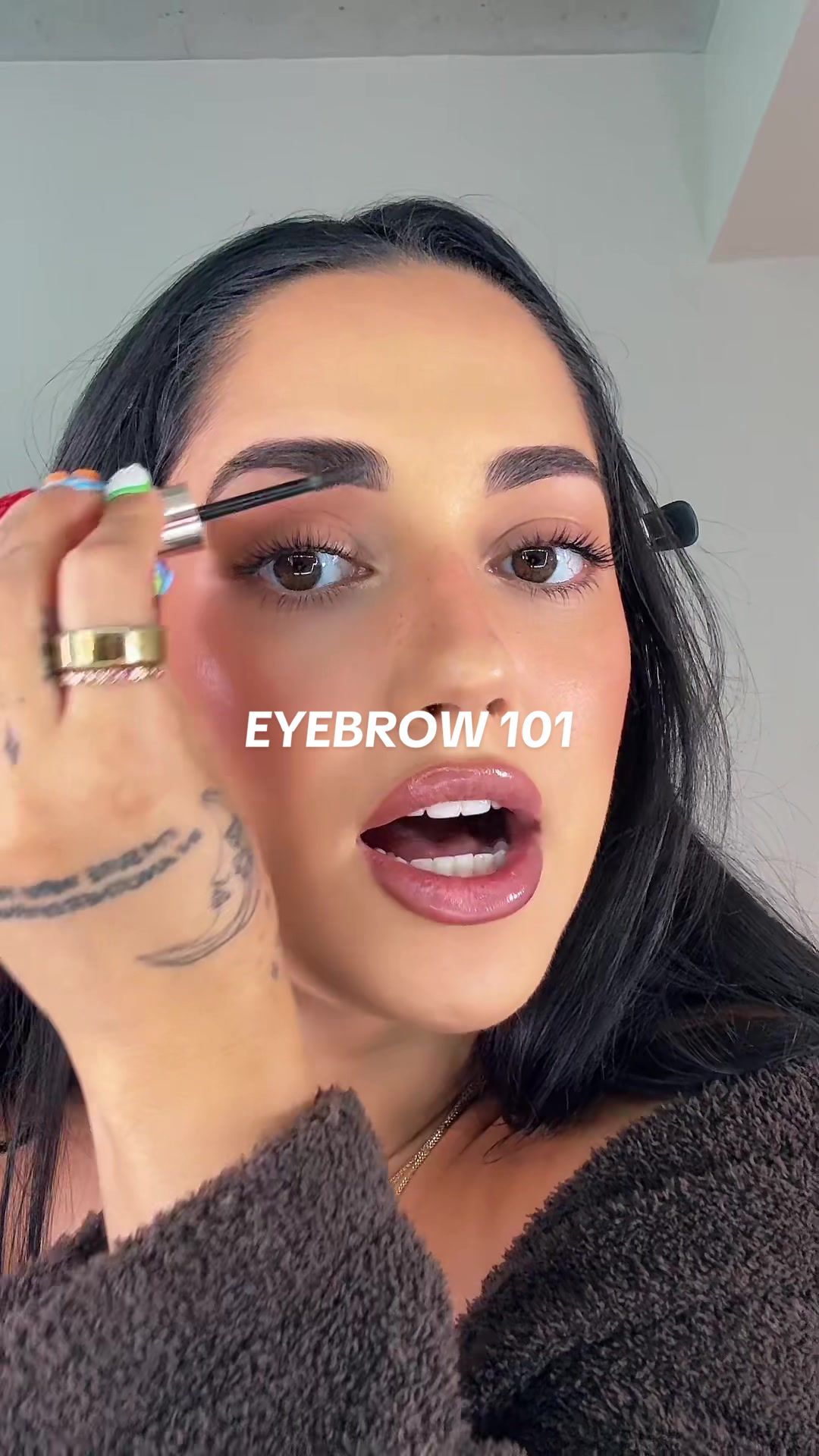 TikTok post by @daniellalopez9988 for ILIA Beauty. Caption reads: [...] #eyebrowtutorial @ILIA Beauty @Rare Beauty.