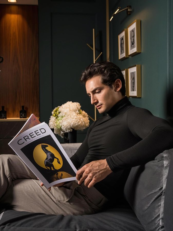 Instagram post by @emilio.marcos for Creed Fragrance. Caption reads: Cut Different #TheHouseOfCreed #AbsoluAventus.