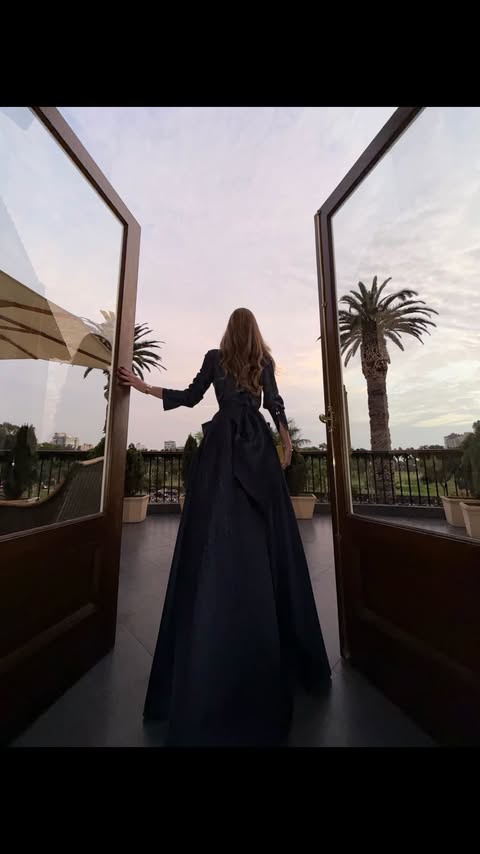 Instagram post by @alessiarovegno for Carolina Herrera. Caption reads: Christmas wrapped in Carolina....