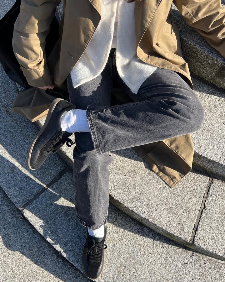 Instagram post by @florencestignan for Maguire Shoes. Caption reads: [...] to take my new simone trainer from....