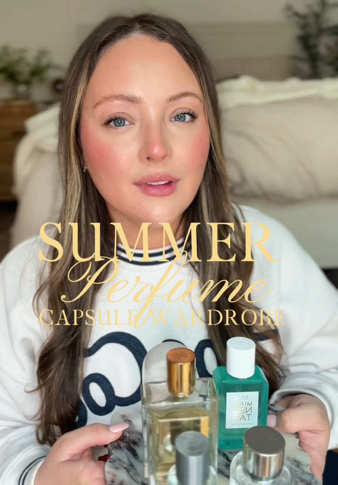 TikTok post by @hollirobi for Lake & Skye. Caption reads: 5 perfume capsule wardrobe for summer ....