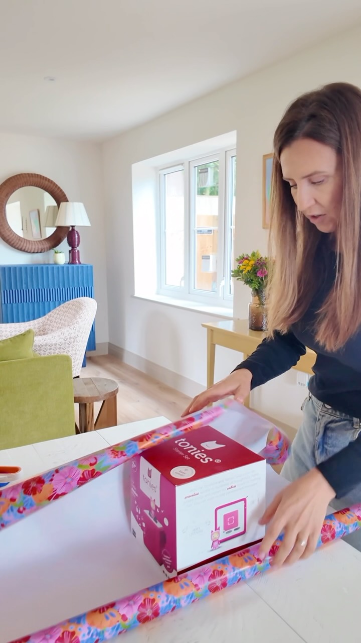 Instagram post by @thefoldinglady for tonies. Caption reads: How to wrap a Tonies box 

Let the gift wrapping....