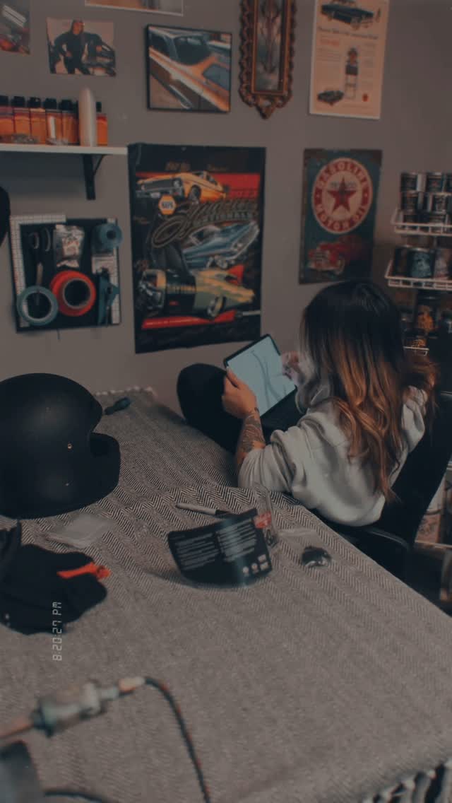 Instagram post by @michellerenexo for Biltwell. Caption reads: Sometimes a day designing with headphones in is....