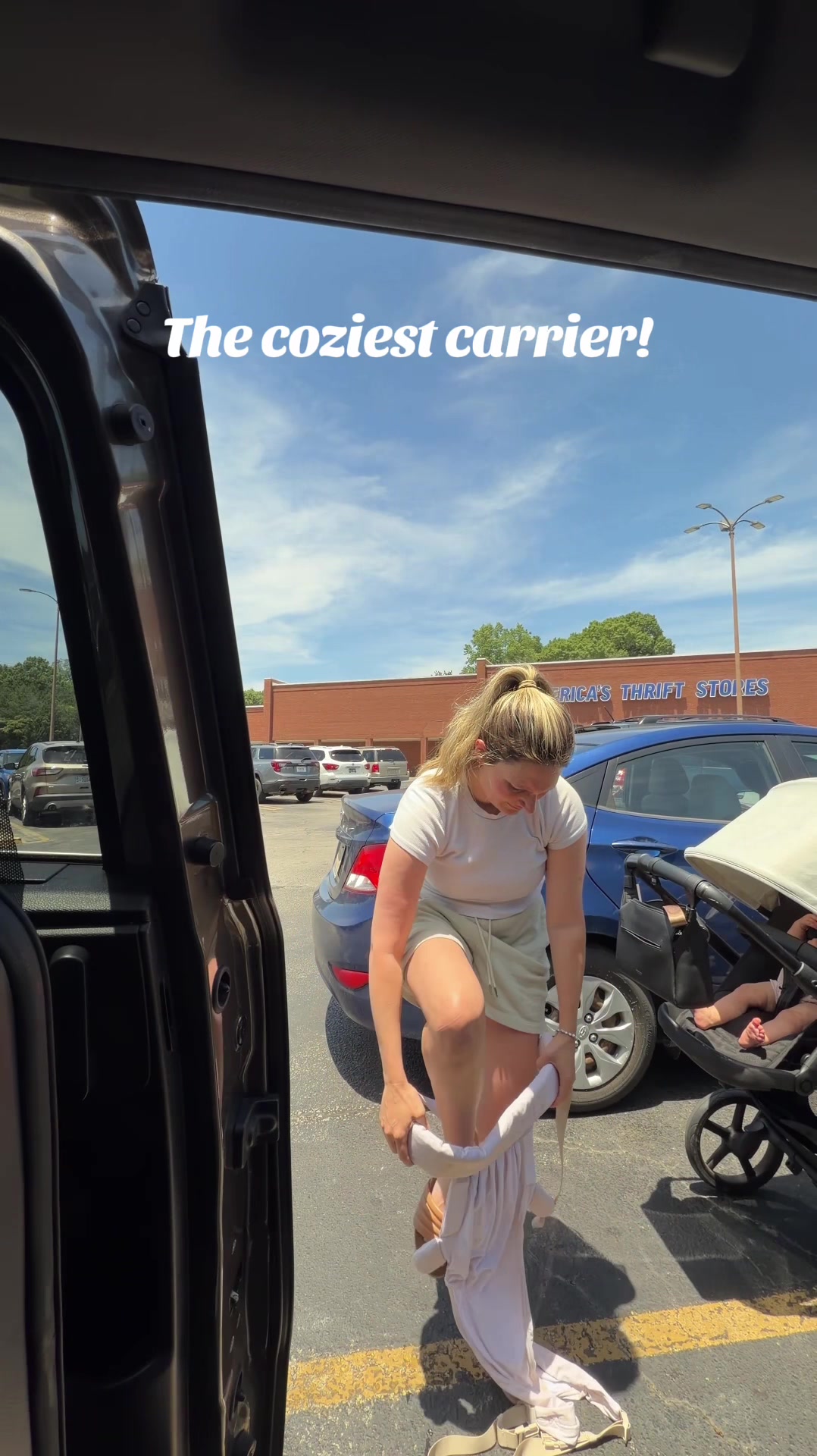 TikTok post by @whitneys_wheelhouse for WILDBIRD. Caption reads: [...] a wrap but the structure of a carrier!....