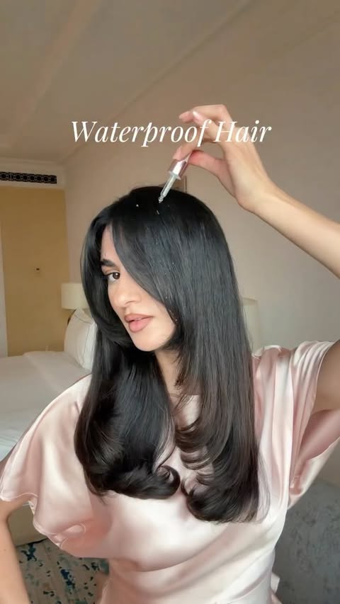 Instagram post by @tasneem.jpg for Kérastase. Caption reads: Summer-proof hair activated ☀️ Glossy shine +....