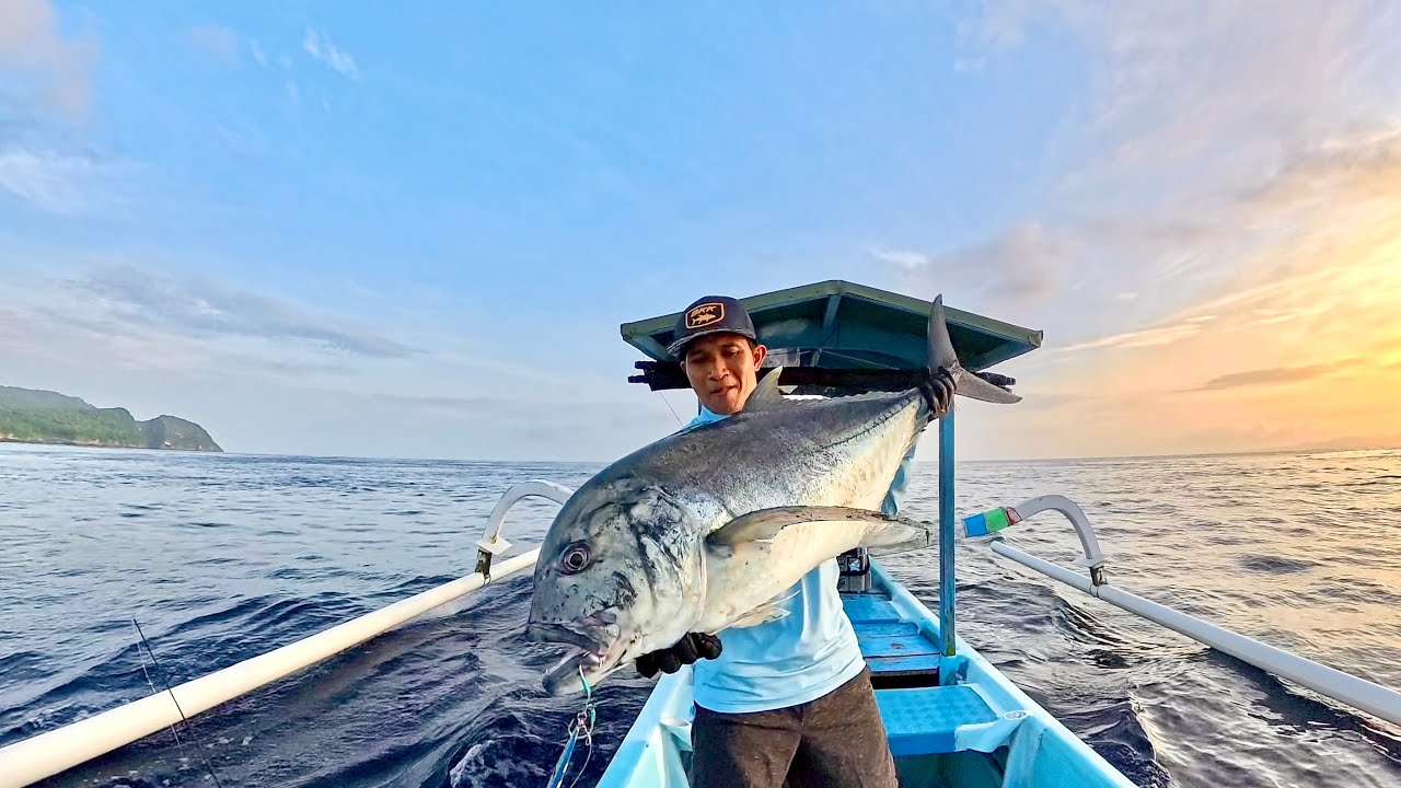 YouTube post by @fishhunterbali19 for Tokopedia. Caption reads: SUPER BABON JACKPOT AT THE BEGINNING OF 2026!!!.