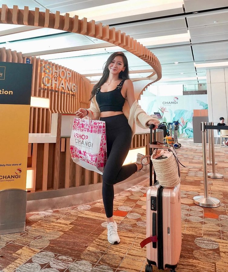 Instagram post by @novitalam for iShopChangi. Caption reads: Baggage allowance may put you off packing your....