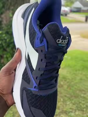 TikTok post by @thecandylady07 for SHOEBACCA.COM. Caption reads: Yall better 🏃🏾 these Diadora’s are so fly....