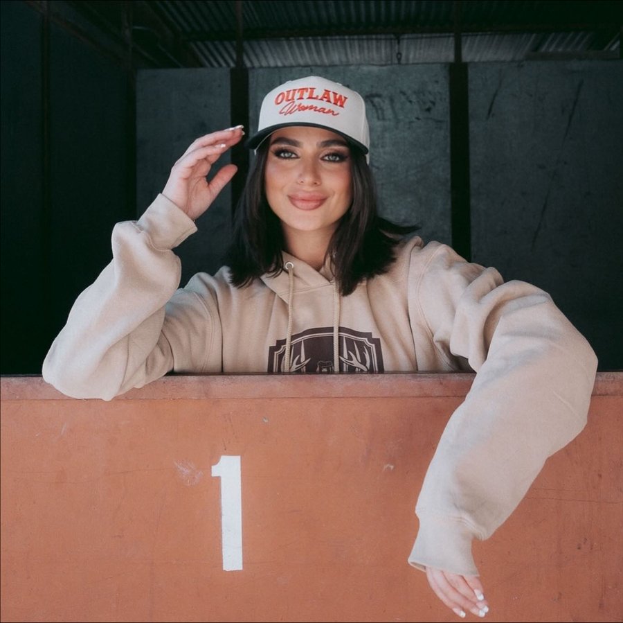 Instagram post by @hallzayy for Willow Boutique. Caption reads: Definitely born to raise hell in this....