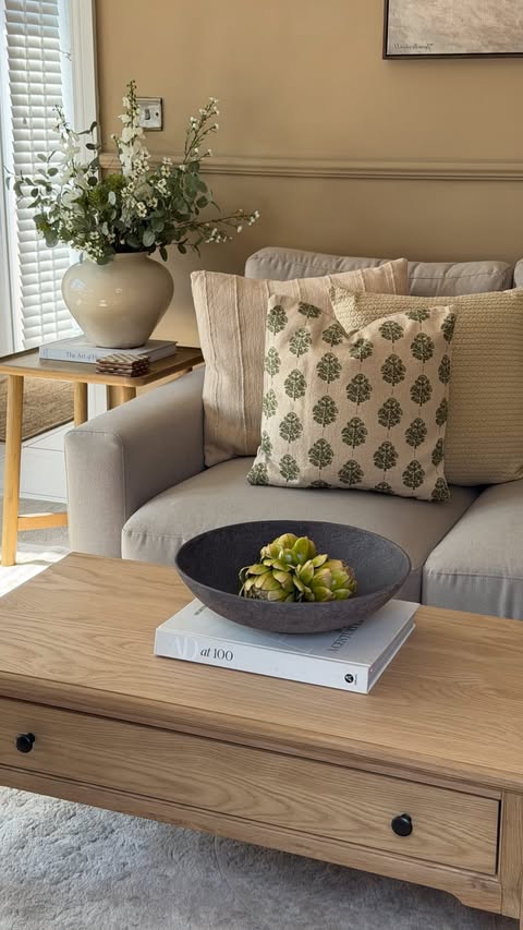 Instagram post by @_katiepeakehome for Very. Caption reads: [...] new coffee table & decor cushions from....