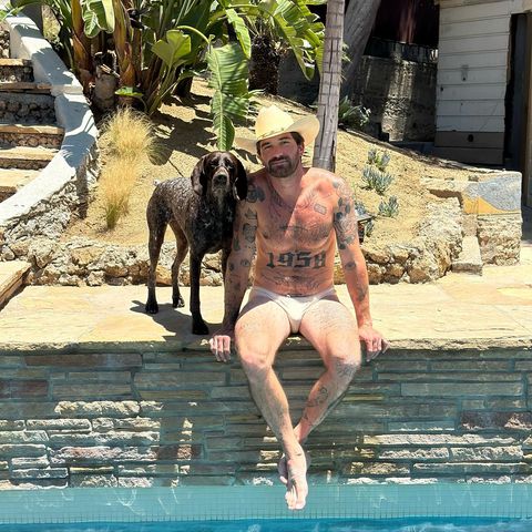 Instagram post by @itschrisdamned for Coyote Jocks. Caption reads: Pool side with my main gal and my @coyotejocks....