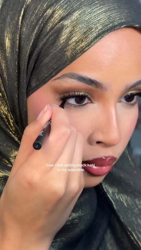 Instagram post by @beautybyyasi for Huda Beauty. Caption reads: @hudabeauty kohl liner.