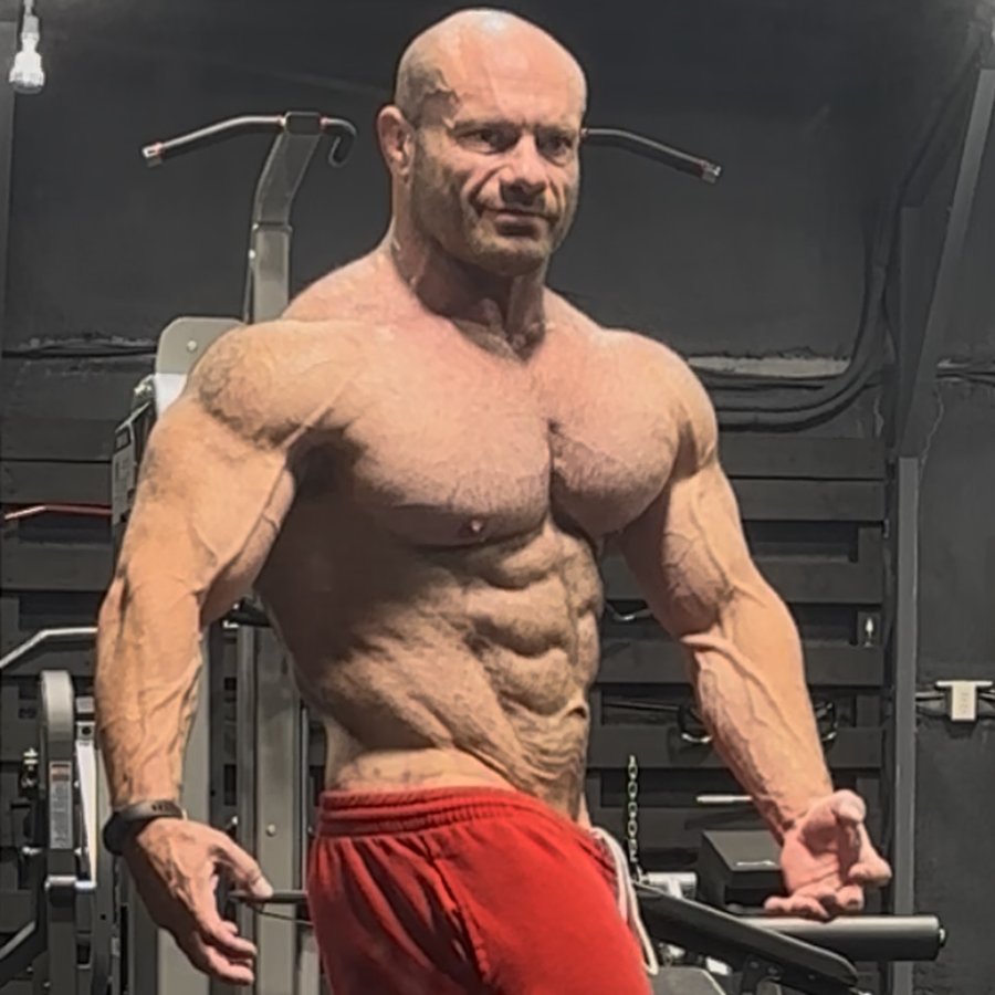 Instagram post by @drmikeisraetel for RP Strength. Caption reads: Pics from my chest/triceps workout today!....