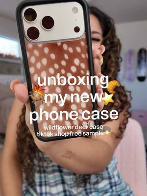 TikTok post by @rashellthadoll for Wildflower Cases. Caption reads: unbox my new phone case 🦌🍁 @Wildflower Cases....