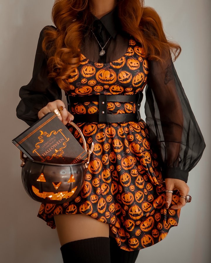 Instagram post by @ghosts.of.october for Blackmilk Clothing. Caption reads: 💜🧡 Trick or Treat 🧡💜 We’re off to go Trick or....