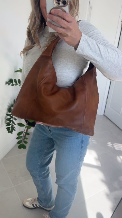 Instagram post by @lifesimplybyk for Latico Leathers. Caption reads: If you are a jeans and tee girl like me these are....