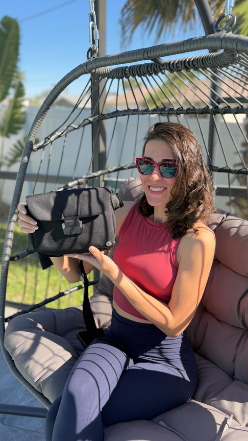 Instagram post by @myusalifee for AquaVault. Caption reads: #ad The AquaVault Lockable Cross Body Travel Bag....