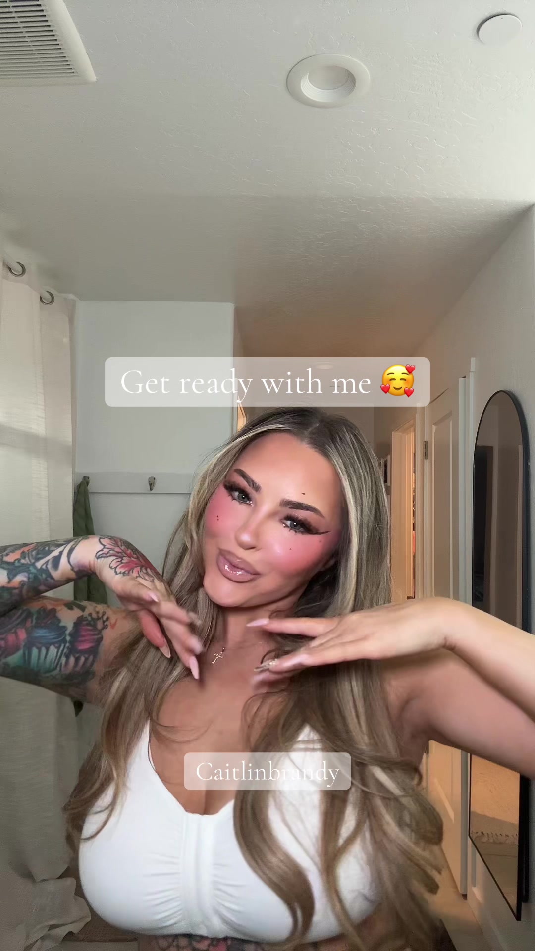 TikTok post by @caitlinbrandyy for BELLAMI Hair. Caption reads: [...] @wavytalkofficial @Bellamihair @SHEIN @Huda....