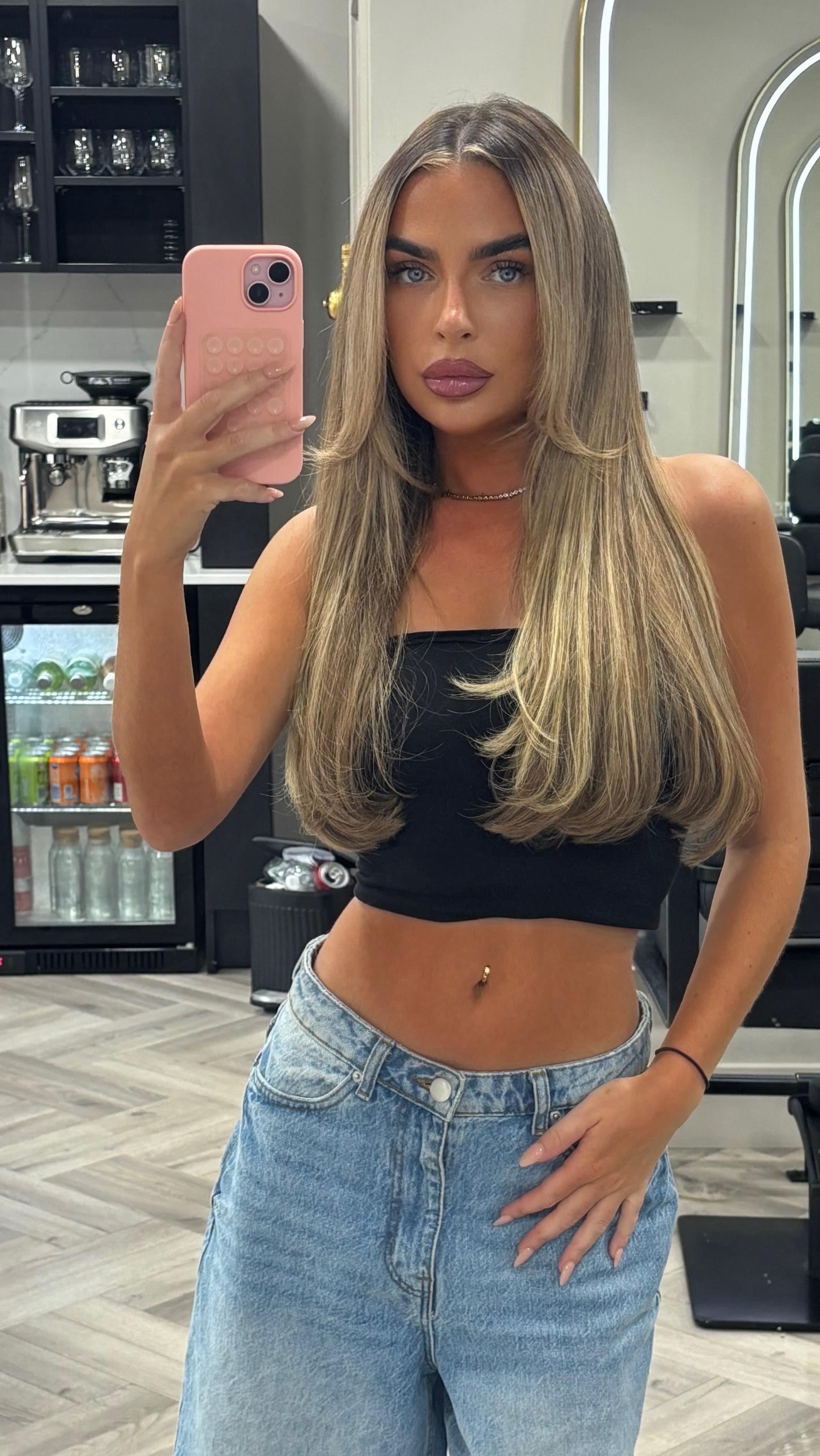Instagram post by @millie.browwn for Cliphair. Caption reads: [...] >>>> Obsessed with my new hair using....