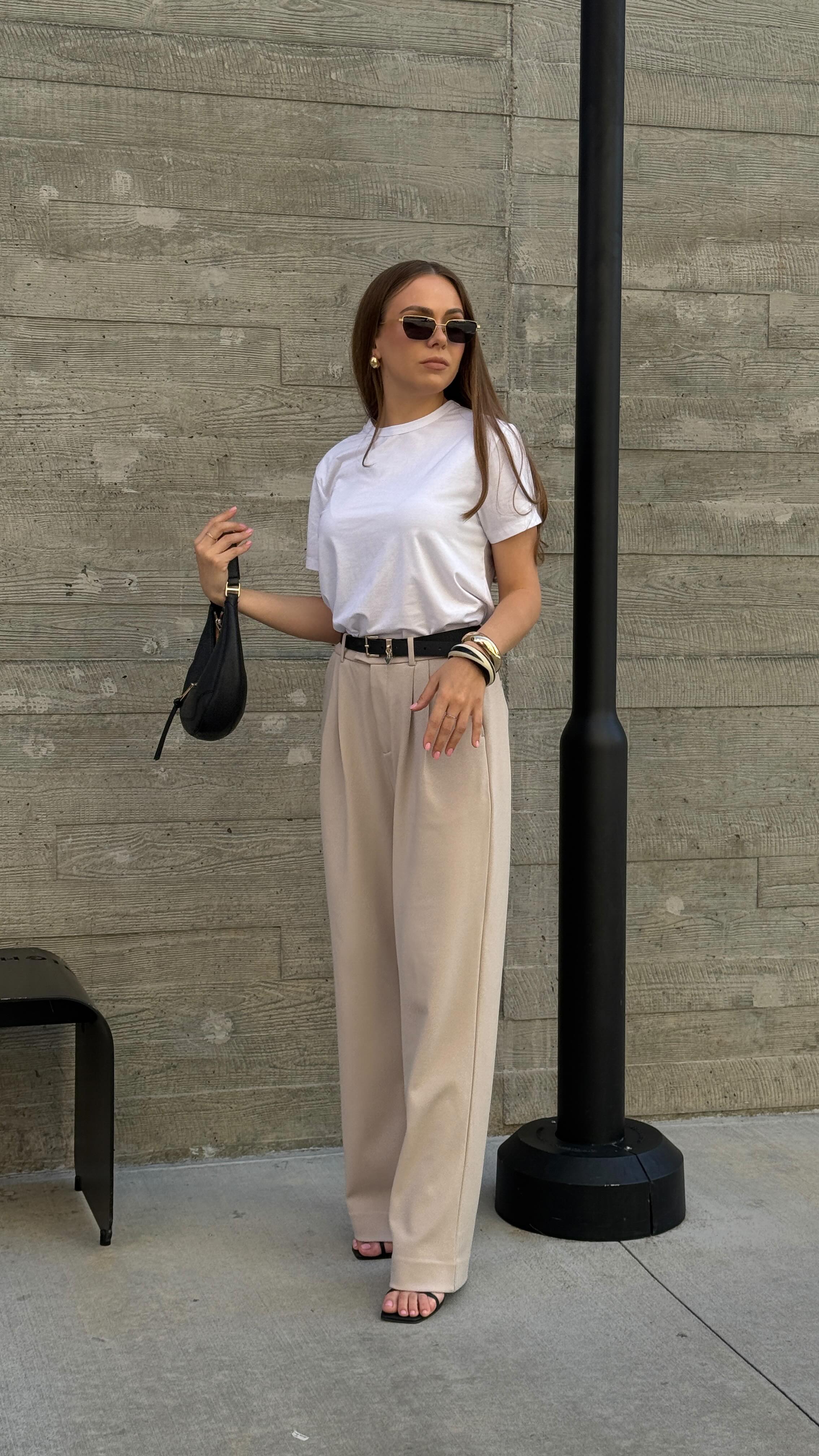 Instagram post by @symonenko.blog for Cuts Clothing. Caption reads: I love when clothes highlight femininity and....
