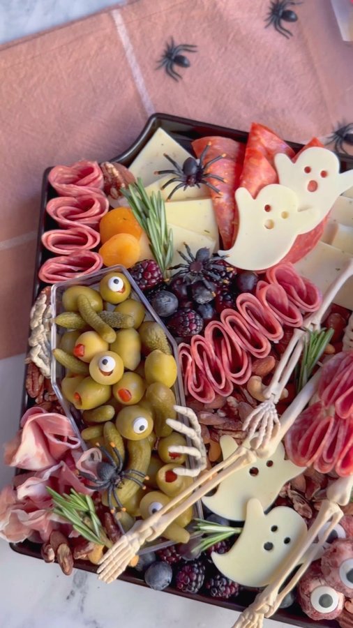 Instagram post by @charcuterie_n_things for Dietz & Watson. Caption reads: Halloween hosting, simplified! Bold, flavorful....