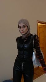 Instagram post by @noore for Nunoobags. Caption reads: Two NYE outfits styled with @nunoobags Metal Mesh....