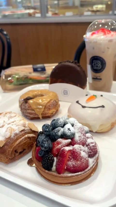 Instagram post by @yyz.foodies for GTAeatsNmeets, Toronto. Caption reads: 🎄Get your holiday treats @eglinton.parisbaguette....