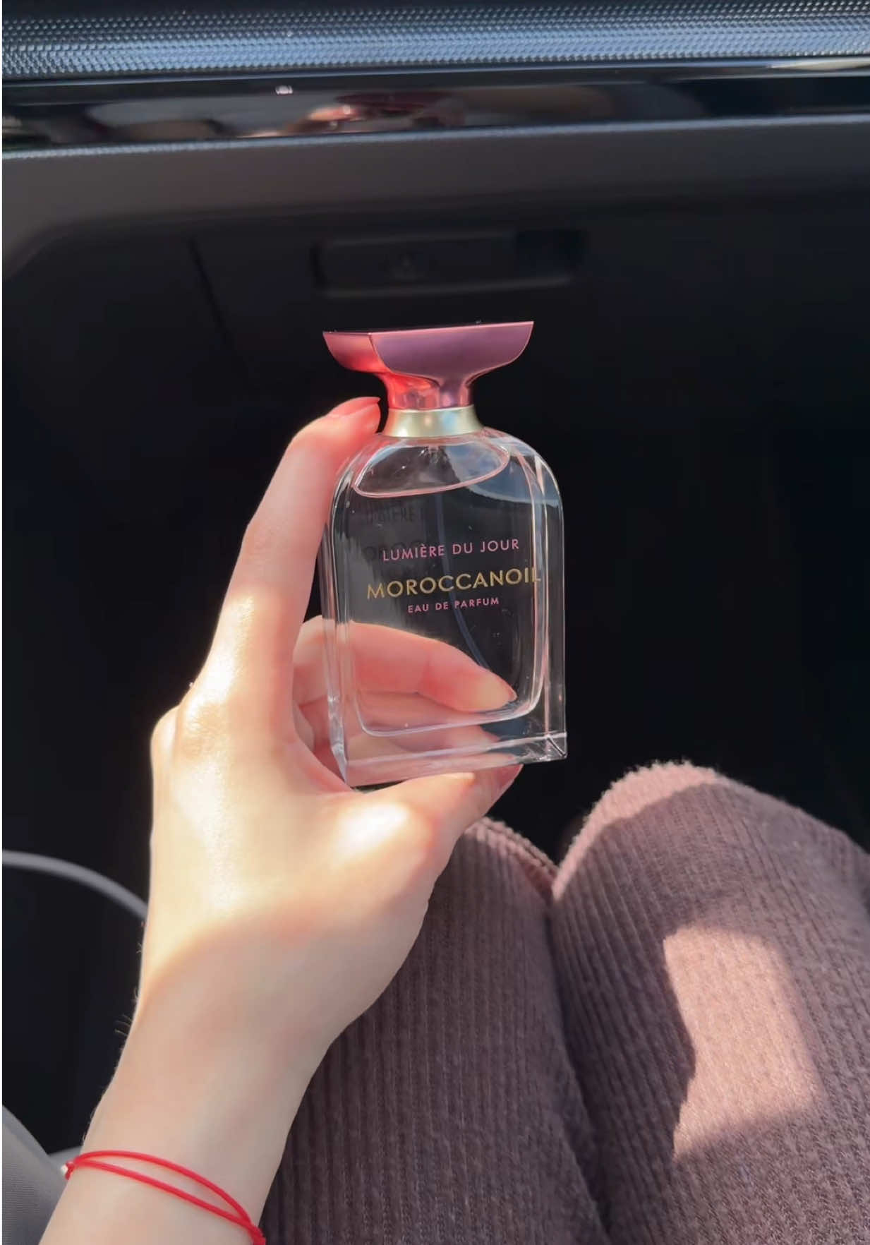 TikTok post by @psychictexas for Moroccanoil. Caption reads: New @Moroccanoil perfume this scent is [...].