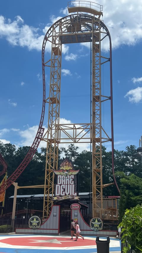 Instagram post by @savvymamalifestyle for Six Flags. Caption reads: [...] nonstop fun—summer is in full swing at....
