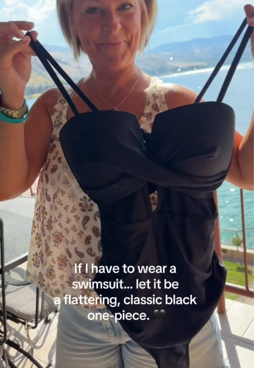 TikTok post by @thestillfarm for Popvil. Caption reads: [...] flattering, classic black one-piece. 🖤....