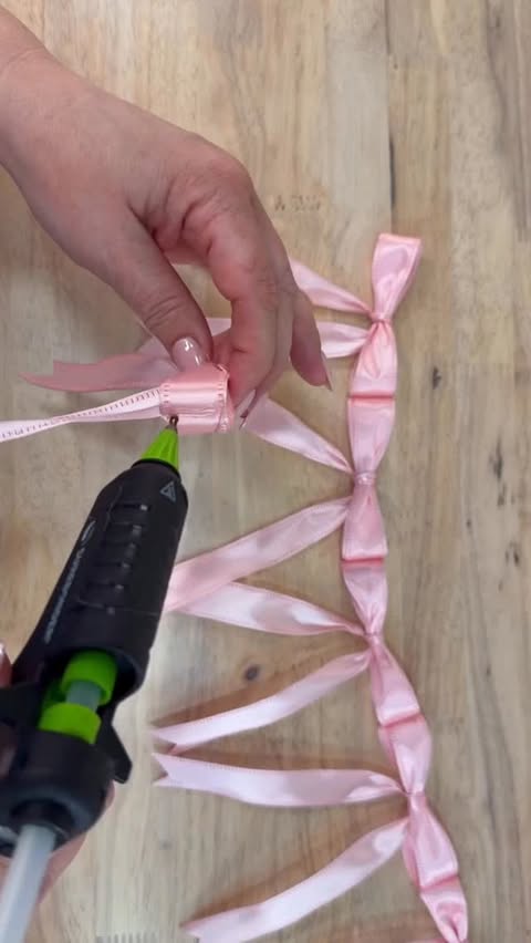 Instagram post by @julieswreathboutique for Hobby Lobby. Caption reads: [...] 💗 I’m using pink wired ribbon from Hobby....