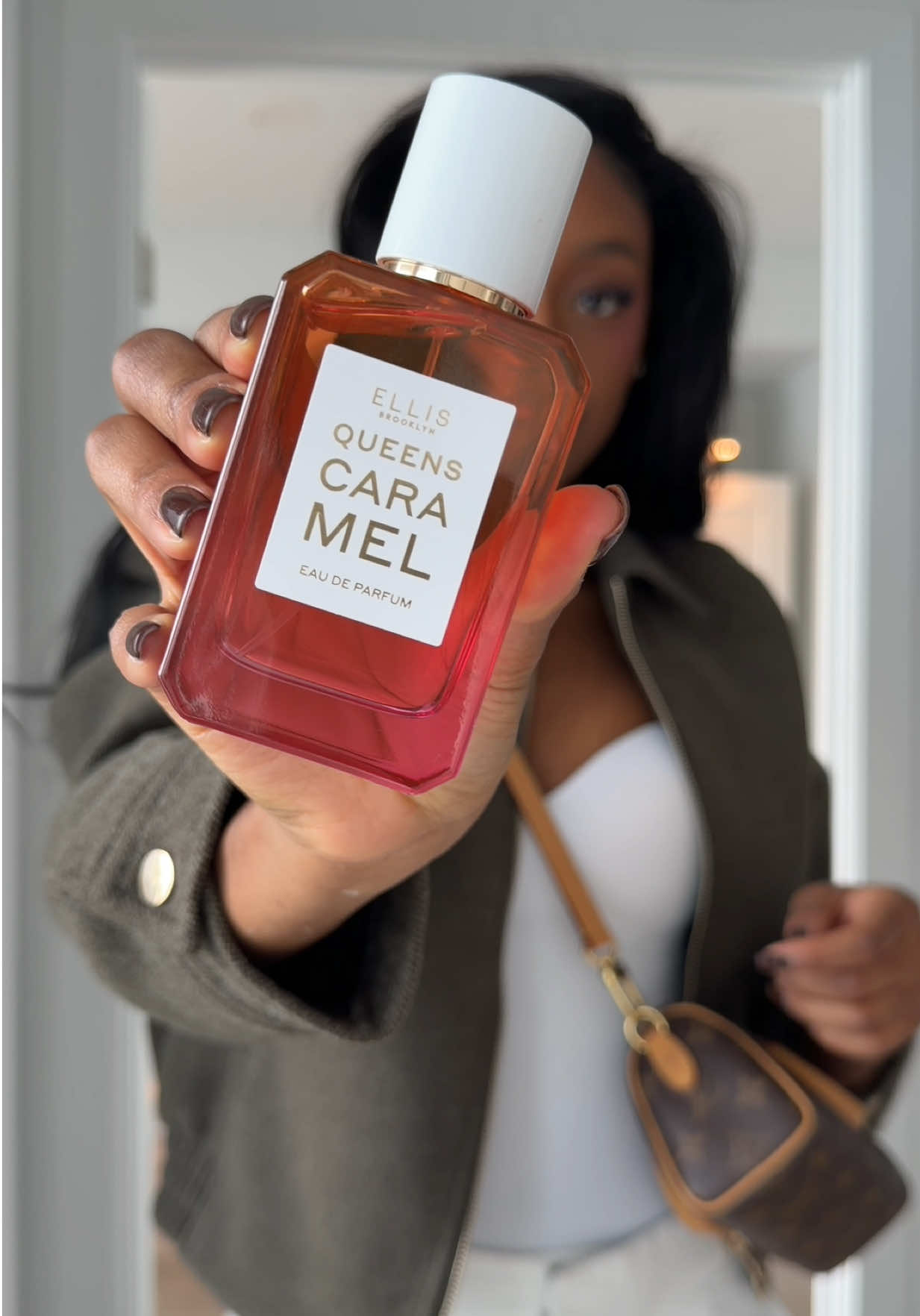 TikTok post by @fatimabahxo for Ellis Brooklyn. Caption reads: How to smell edible 101, this queens caramel....