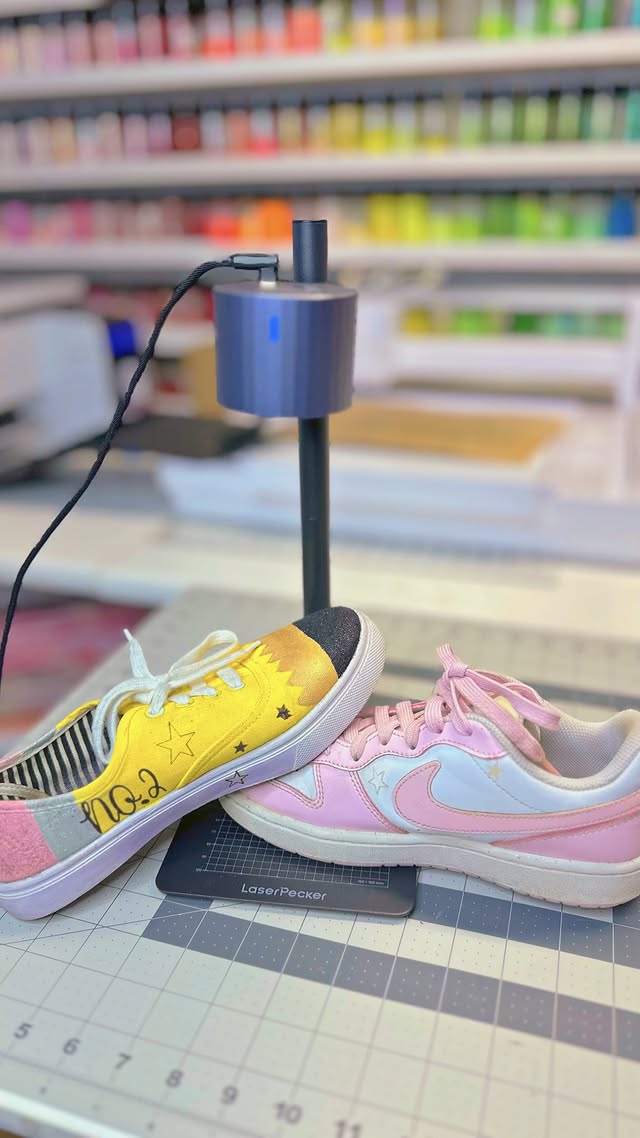 Instagram post by @craftingbymayra for LaserPecker. Caption reads: [...] comment: “Does it work on shoes?” 👀....