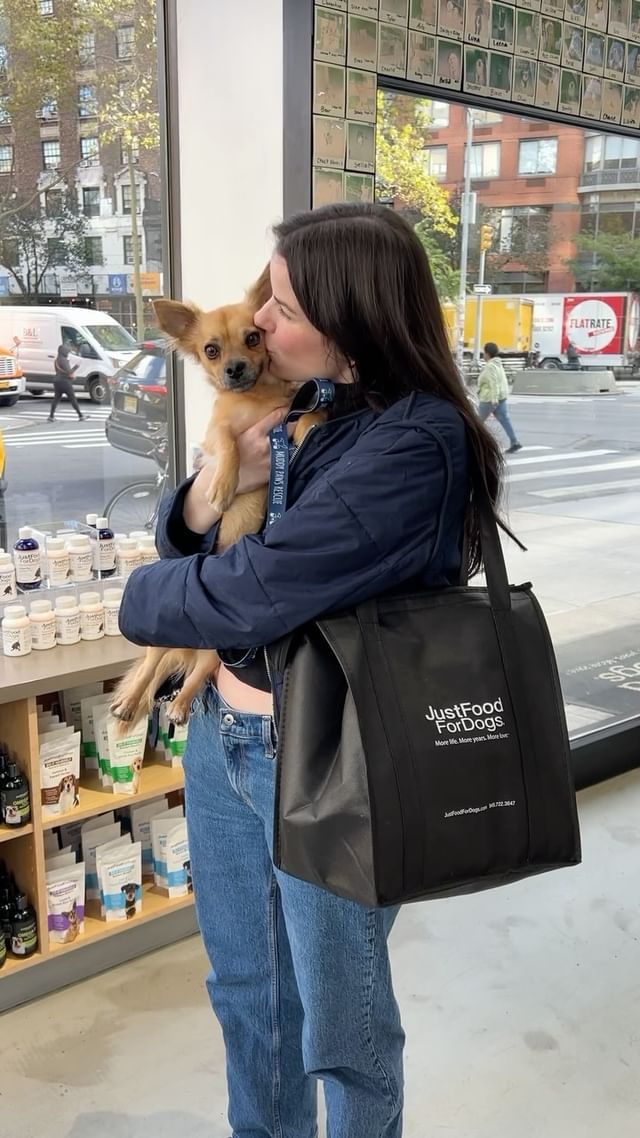 Instagram post by @simonsits for JustFoodForDogs. Caption reads: So happy that we can help Chewy’s future family....
