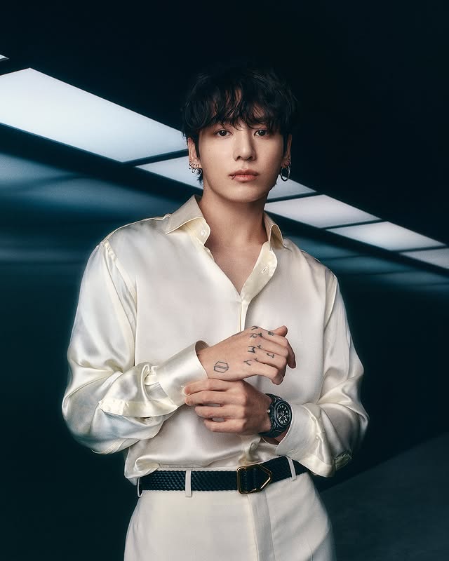 Instagram post by @julien.tornare for Hublot. Caption reads: [...] pleasure that I welcome Jung Kook to the....