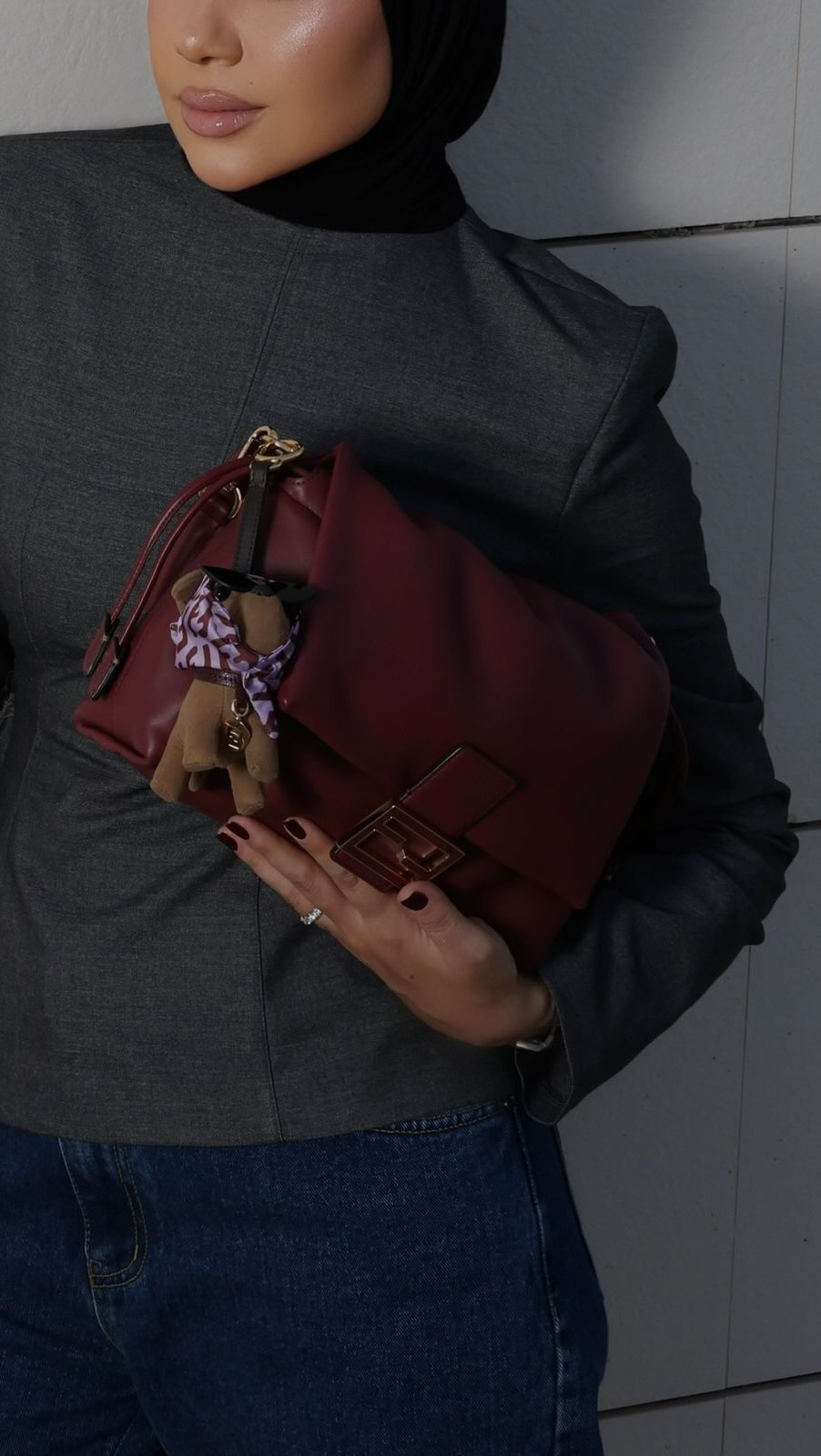 Instagram post by @menna_nabil for Fendi. Caption reads: Caught in a @fendi moment!.