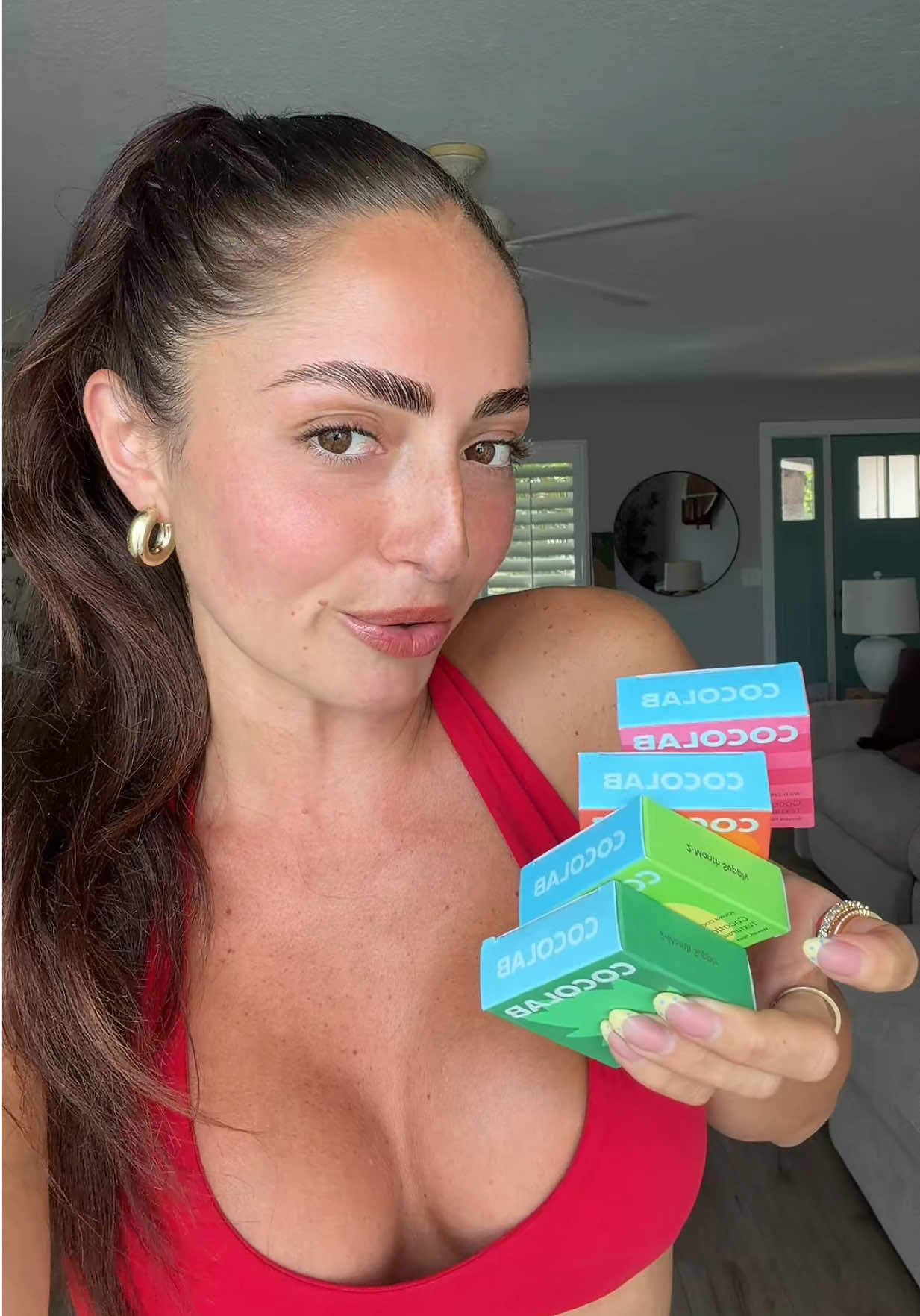 TikTok post by @sabinagilman1998 for Cocofloss. Caption reads: [...] & fresh oral hygiene 🍒🍑🍇🍊 #cocolab....