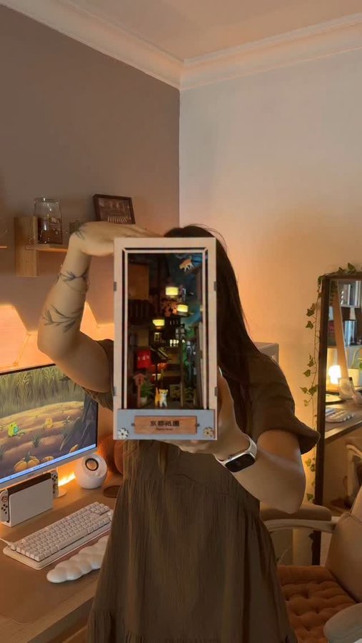 Instagram post by @cosynelle for byanavrin. Caption reads: Making my first booknook made me want to visit....