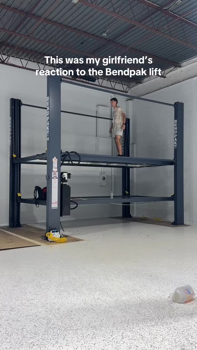 Instagram post by @grant_sloan for BendPak. Caption reads: Only the best for the best 😌 #newcar #dreamgarage....