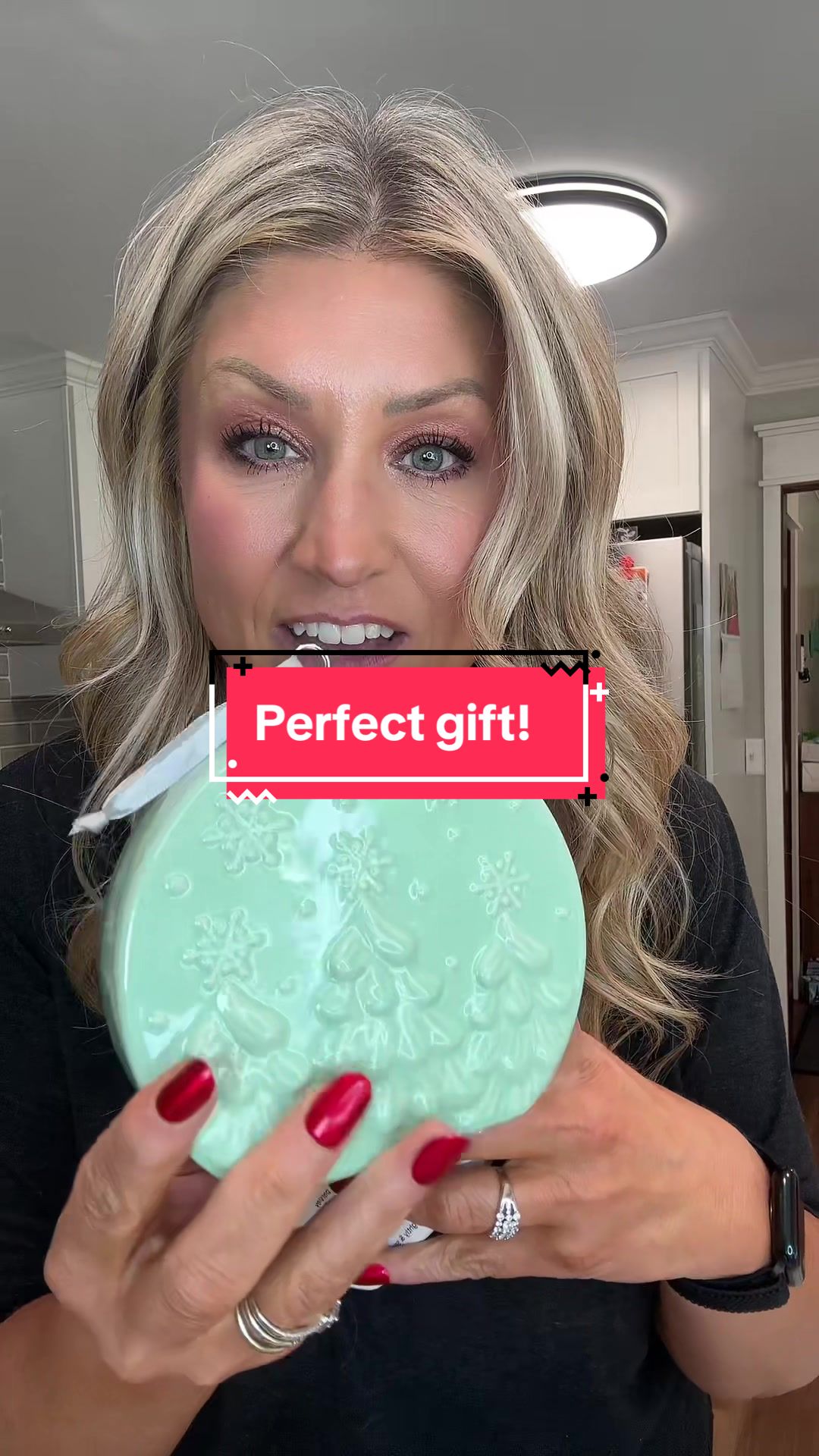 TikTok post by @christylong40 for QVC. Caption reads: [...] gift items from @QVC, Inc #qvc #holidaygifts....