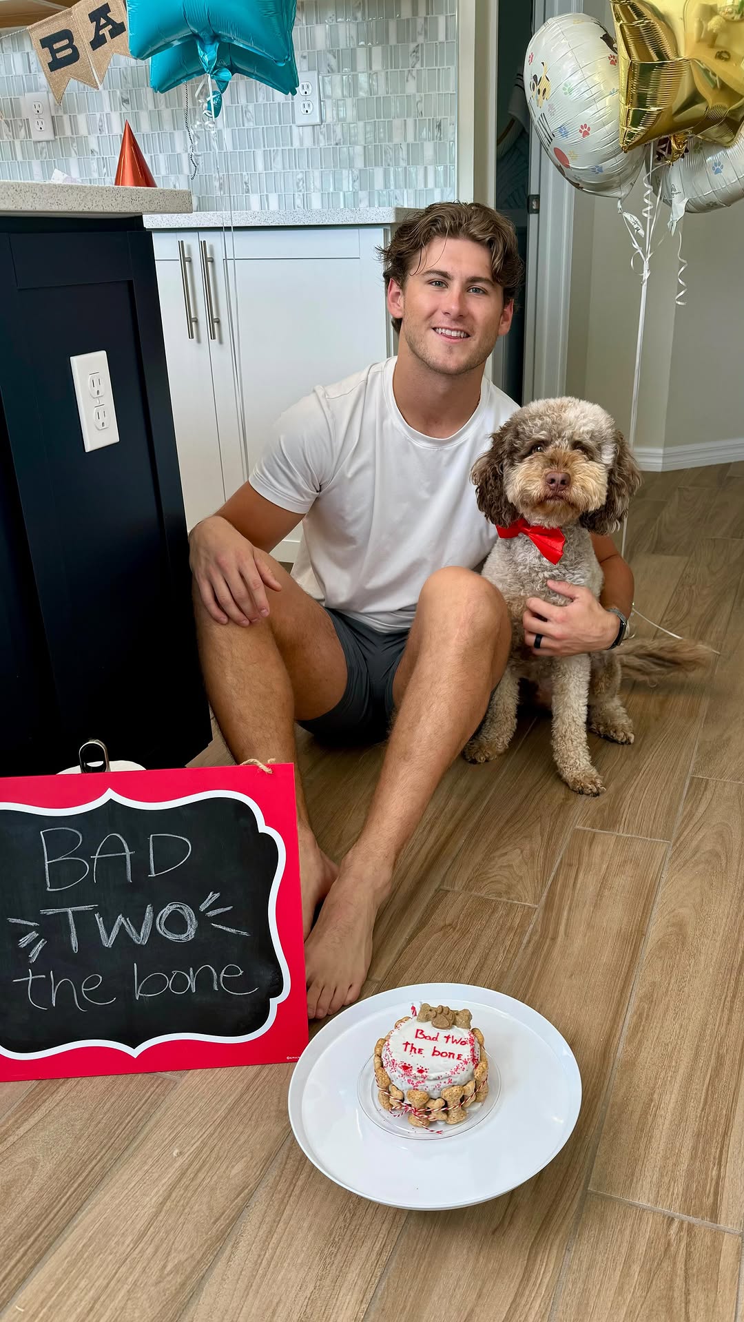 Instagram post by @hannahann for Party City. Caption reads: Bad Two The Bone ♥️🐶🐾
Our Dash turned two! We....
