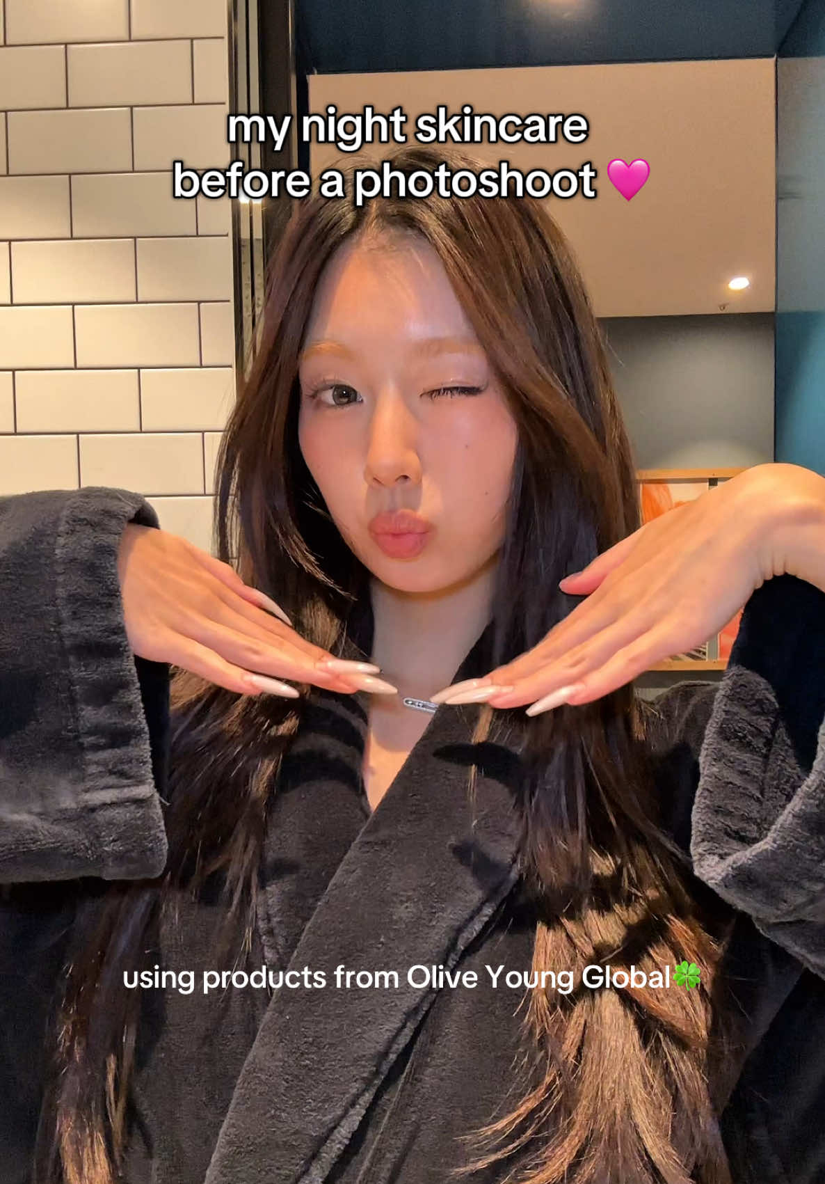 TikTok post by @monakoaa for OLIVE YOUNG. Caption reads: my night skincare before a photo shoot🩷 with....